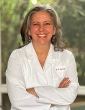 Dr Delia Chiaramonte smiling 