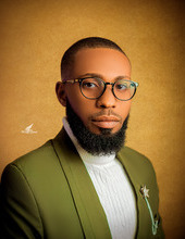 Black male in green jacket, yellow background